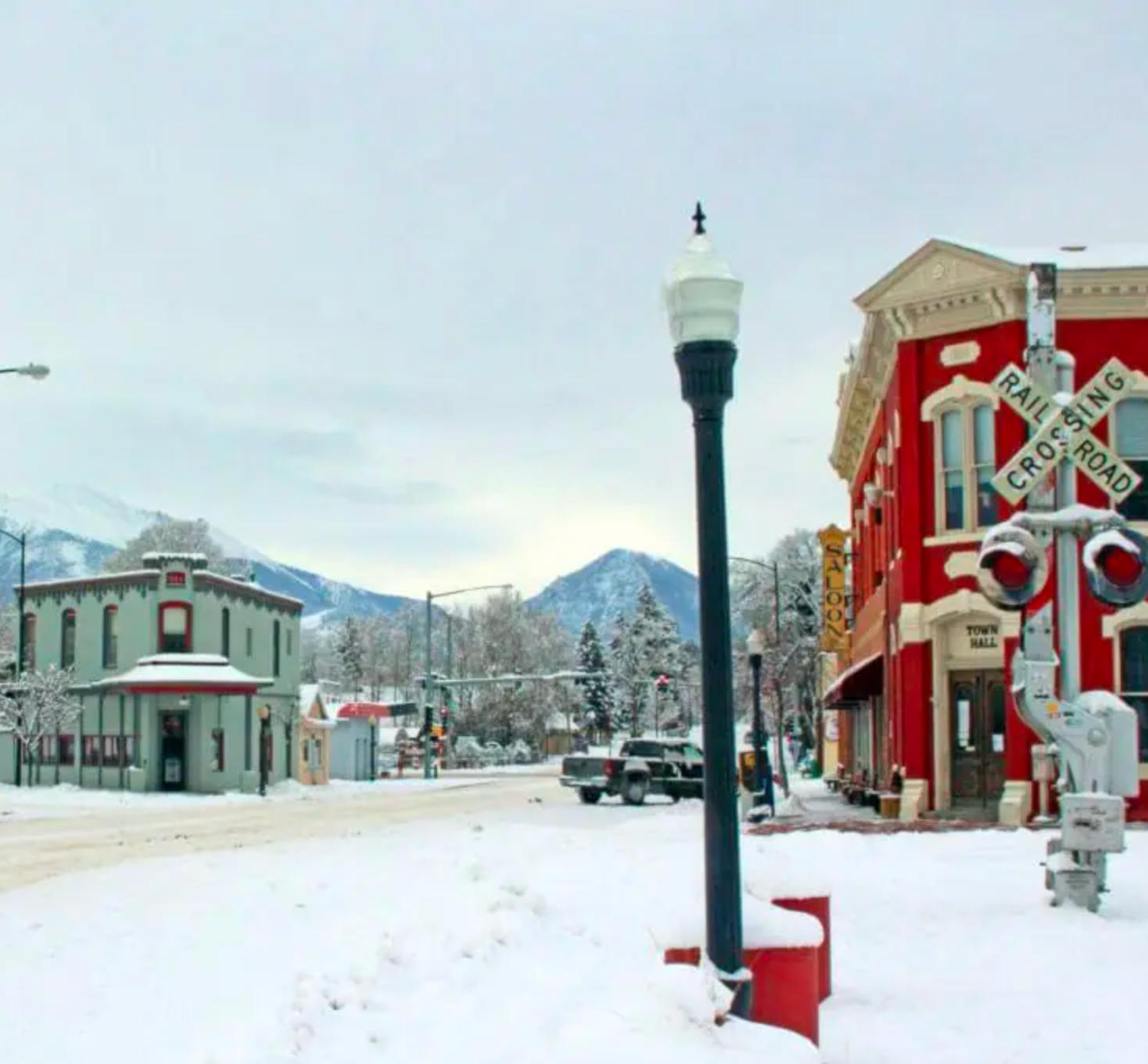 looking west from East Main Street, Buena Vista, Colorado. the Chamber of Commerce Building in View. Collegiate Peaks mountain range in the background. 